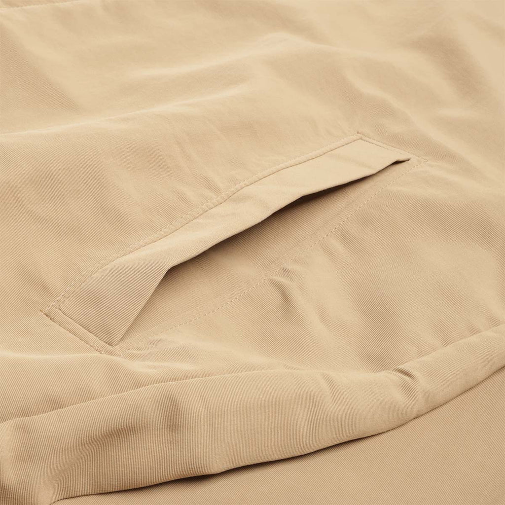 Zip pocket detail on khaki Isthmus jacket