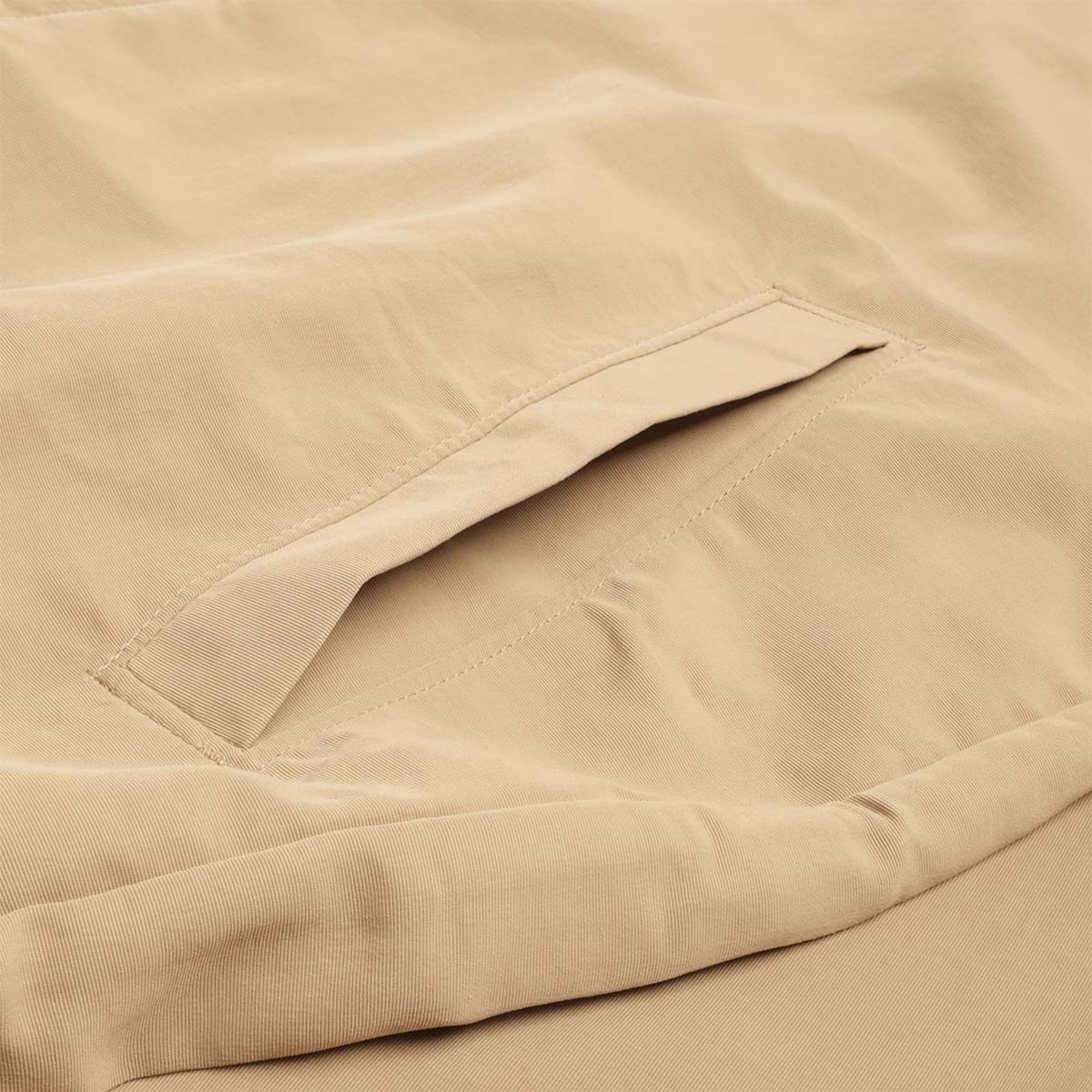 Zip pocket detail on khaki Isthmus jacket