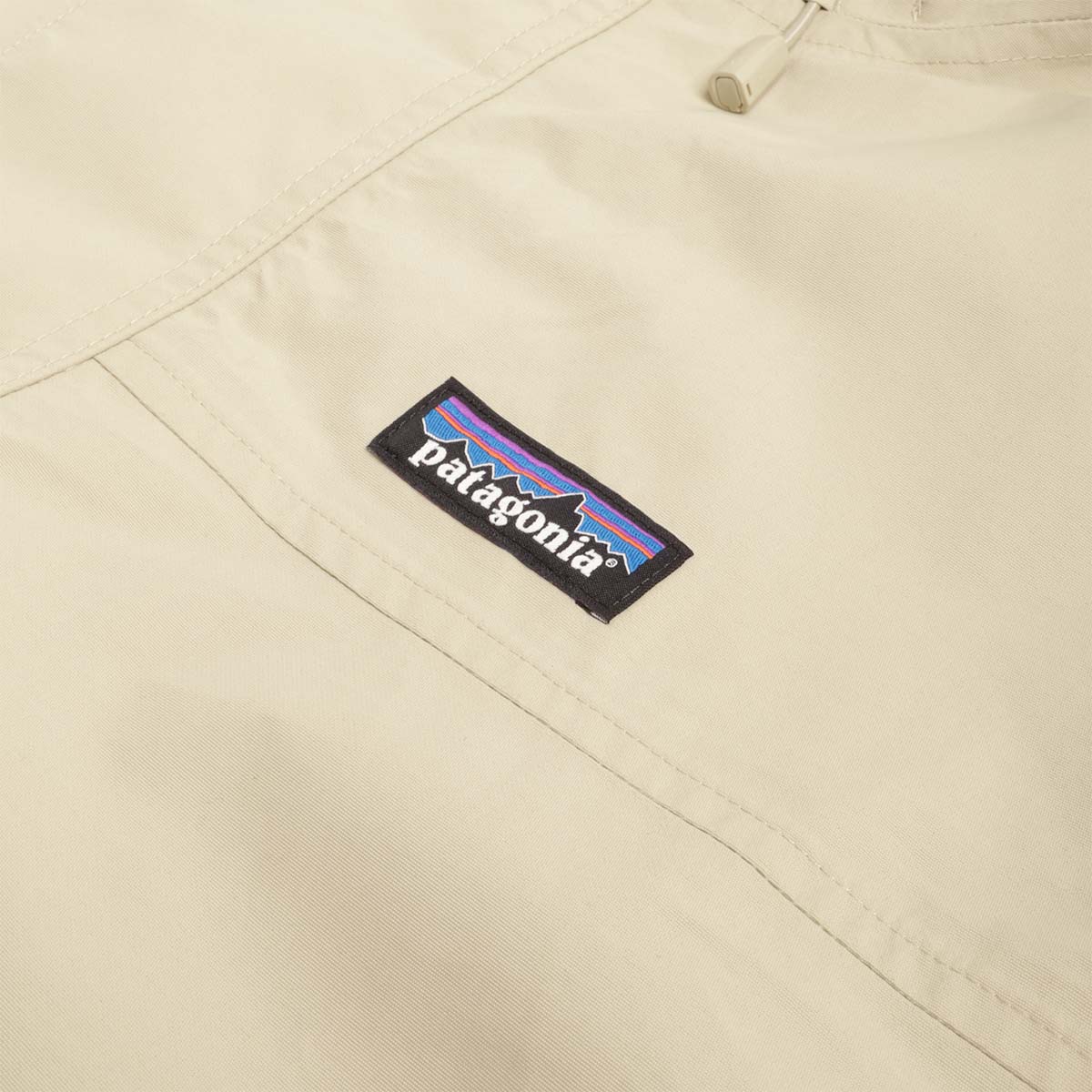 Patagonia label on stone Everyday jacket chest