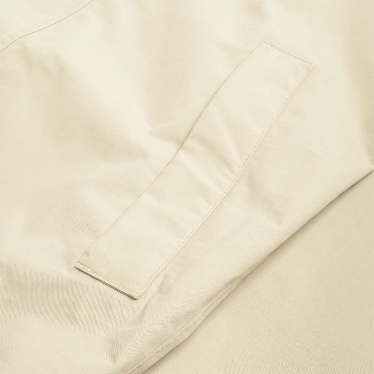 Zip pocket detail on stone Everyday jacket