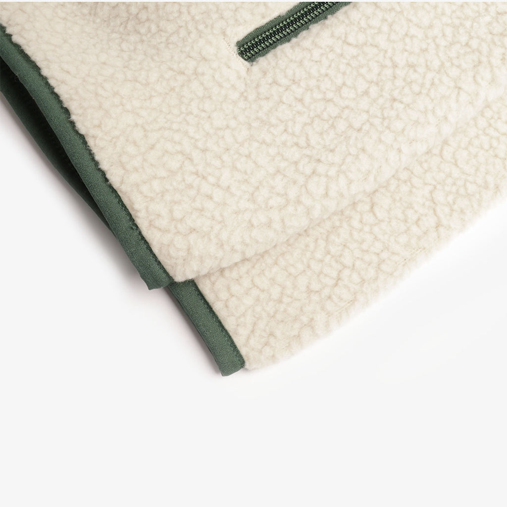 Green-bound hem on cream high-pile fleece, Patagonia