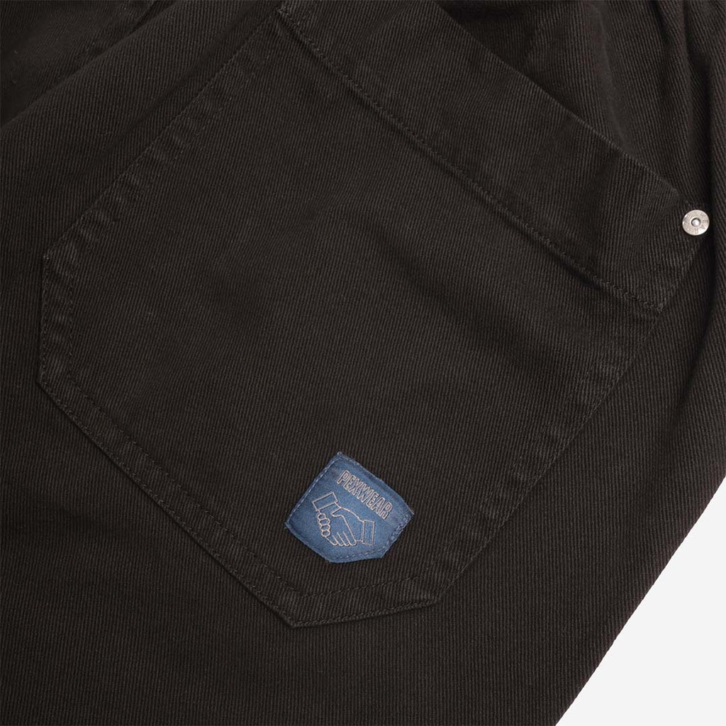 Pexwear Chefs Trousers in Black Twill — styled on model in a workwear setting, Urban Industry