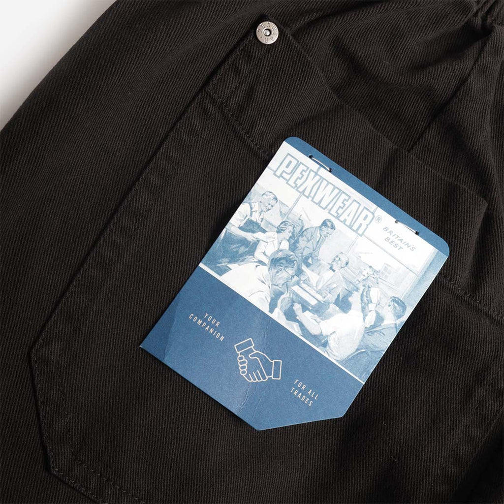 Pexwear Chefs Trousers in Black Twill — hem and leg detail close-up