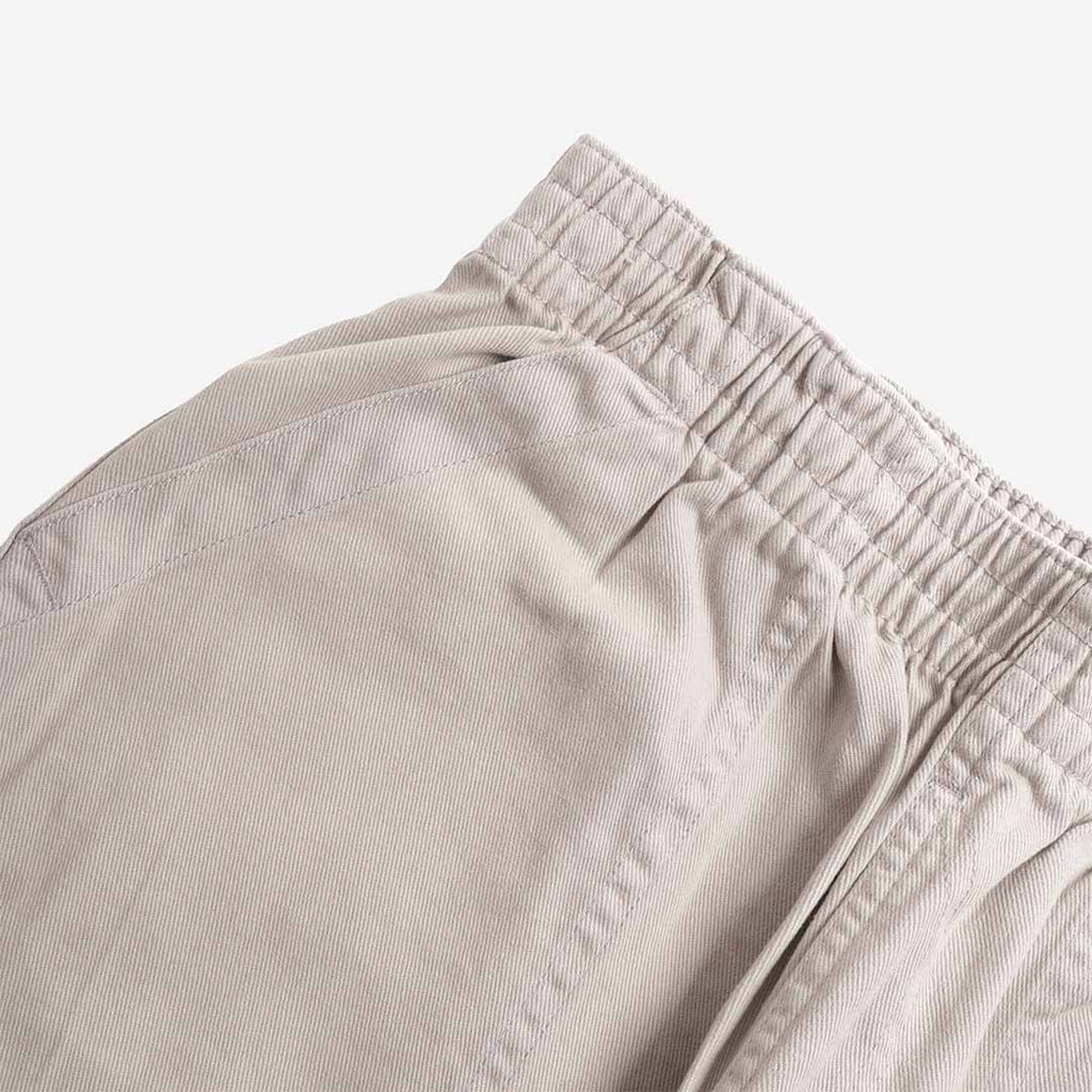 Pexwear Chefs Trousers in Light Grey Twill — close-up of the heavyweight cotton twill fabric weave and stitching