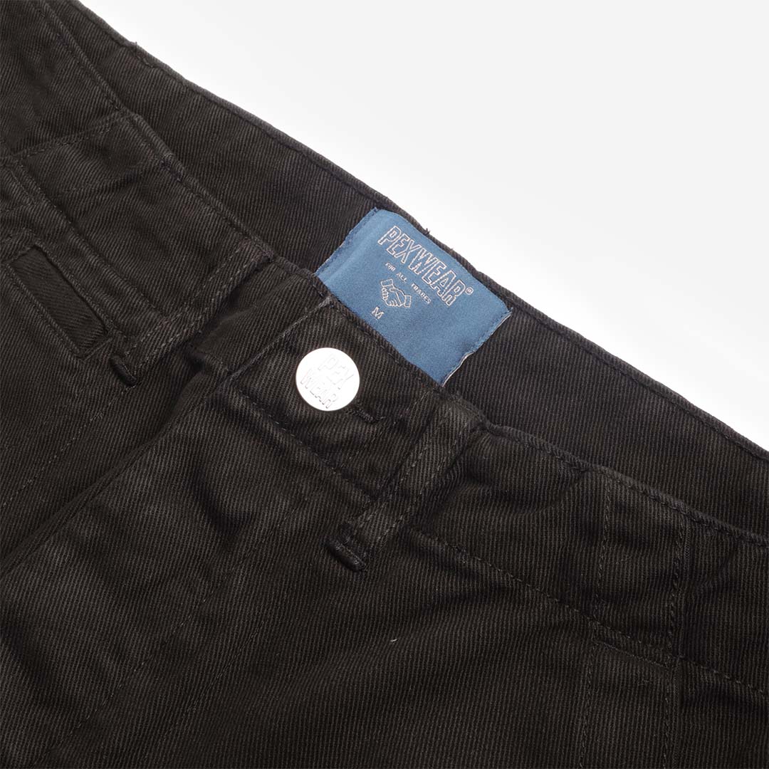 Pexwear Stewards Trousers in Black Twill — close-up of the heavyweight cotton twill fabric weave and stitching