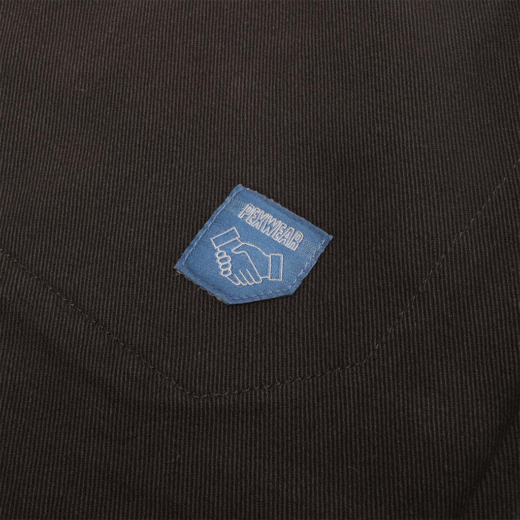Pexwear Stewards Trousers in Black Twill — hem and leg detail close-up