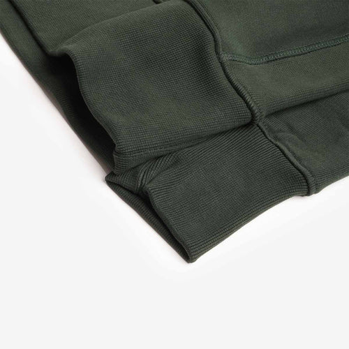 Ribbed cuff and hem detail, forest green rugby crewneck
