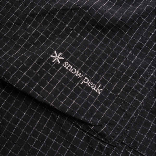 Snow Peak logo print on black ripstop fabric
