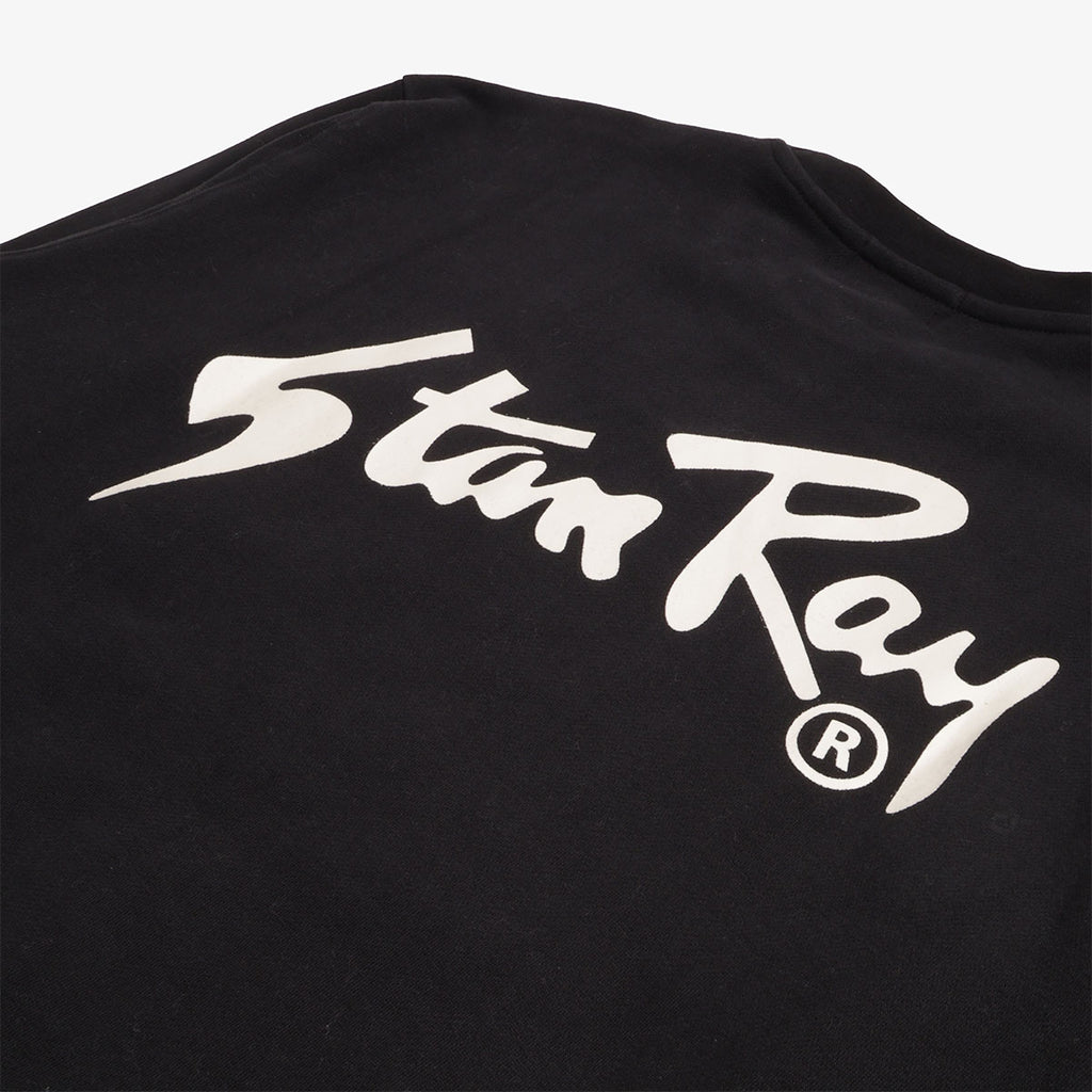 White Stan Ray back print detail on black sweatshirt
