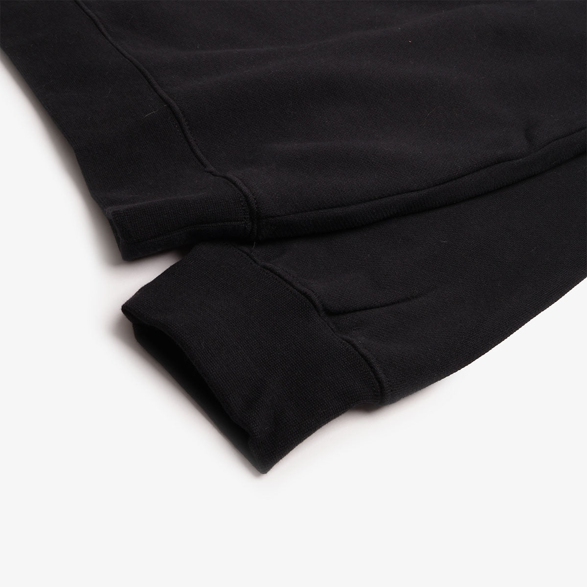 Ribbed cuff and hem detail on Stan Ray black sweatshirt