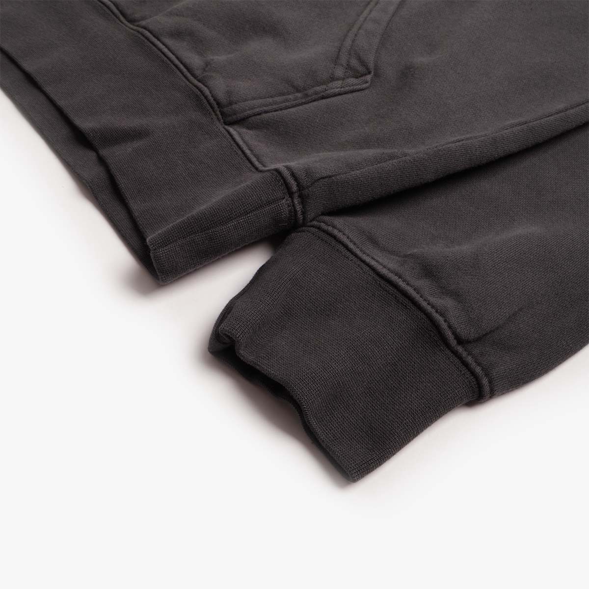 Ribbed cuff and hem detail on Stan Ray washed black hoodie