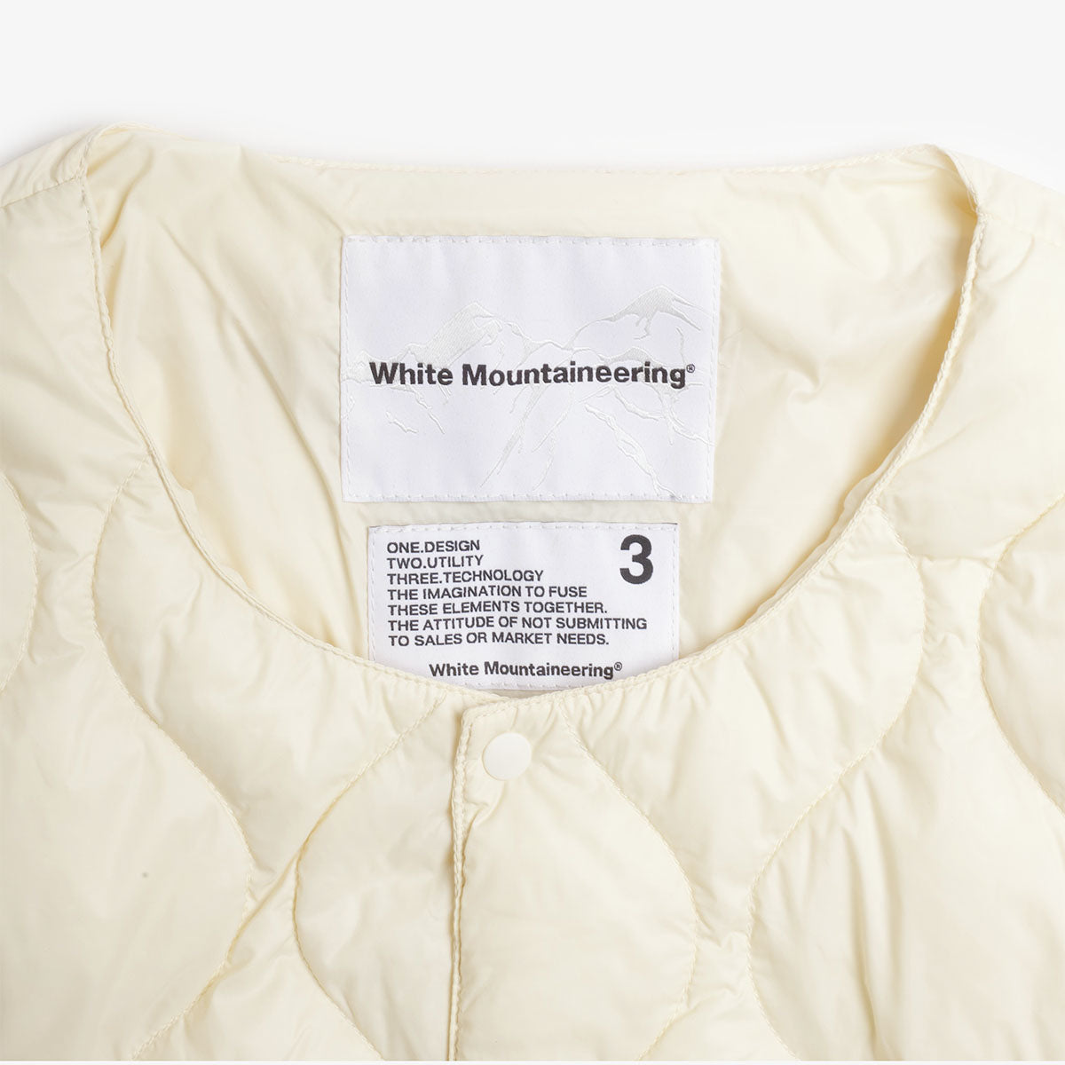 main Taion x White Mountaineering Light Down Jacket