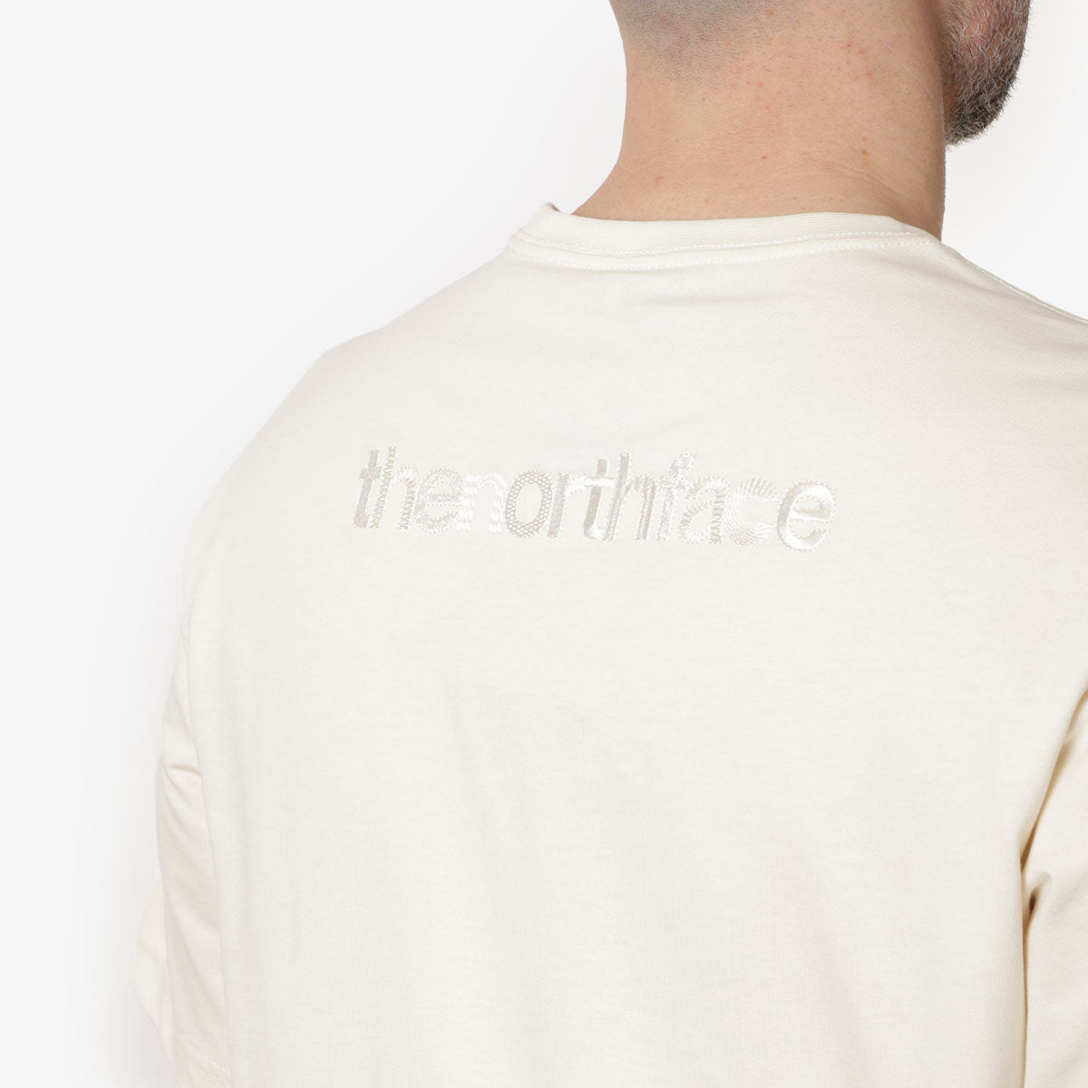 The North Face Logo RMST Relaxed T-Shirt, White Dune, Detail Shot 5