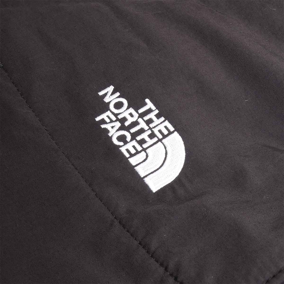 Embroidered The North Face logo on nylon shoulder panel