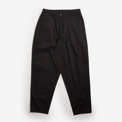 Universal Works Pleated Track Pant in Black, front view