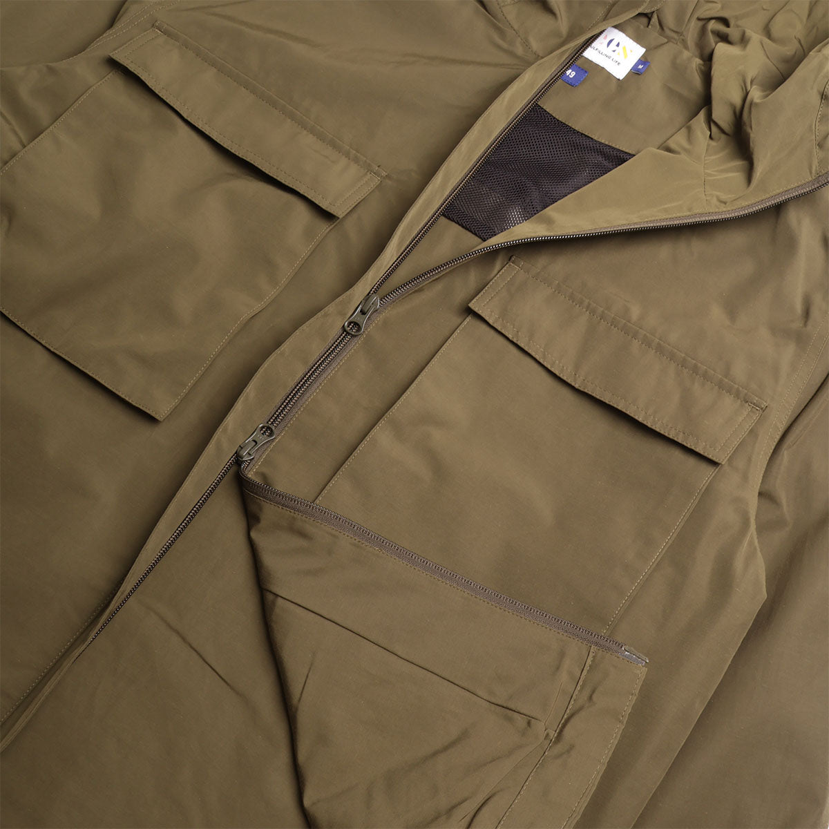 Uskees Evo Shell Coat, Army Green, Detail Shot 4