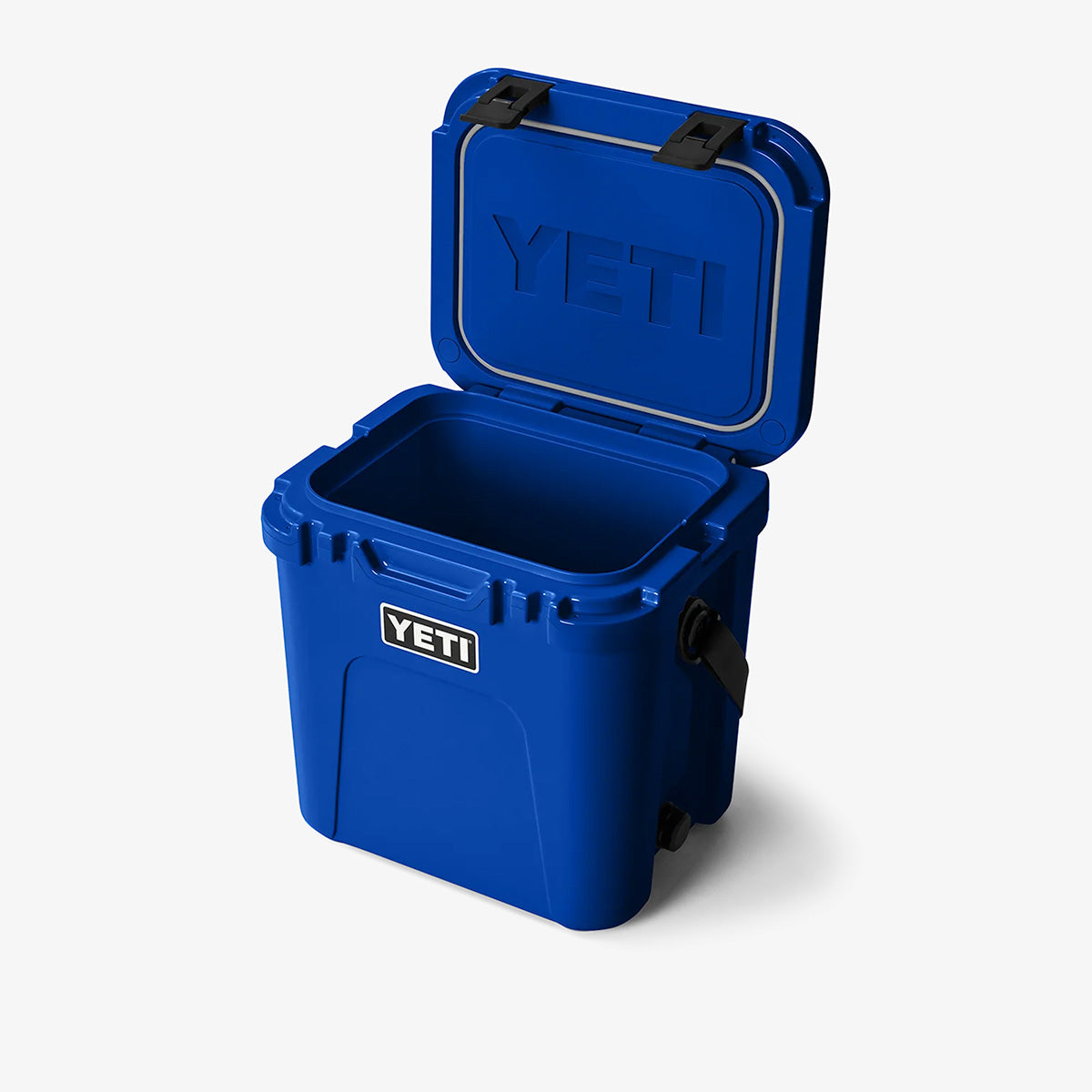 Open lid showing insulated interior, royal blue YETI Roadie 15